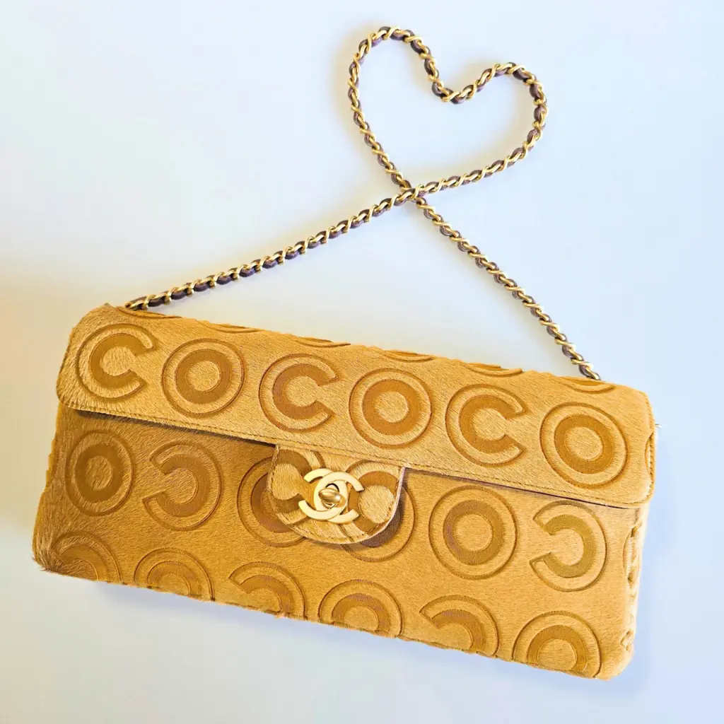 camel-pony-style-calfskin-east-west-chocolate-bar-chanel-handbag-50939339-4_2 Gucci - Image 1