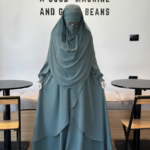 Front view of the Fereha Misty Ment premium set featuring ruffled sleeves and a full-length flowy abaya