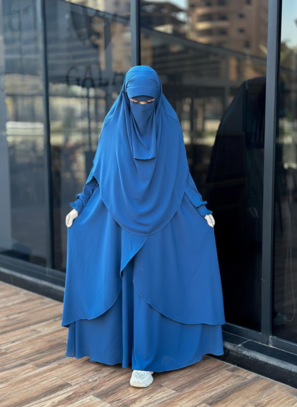 Front full-length view of the Fereha royal blue premium set showing the flowy design and ruffled sleeves.